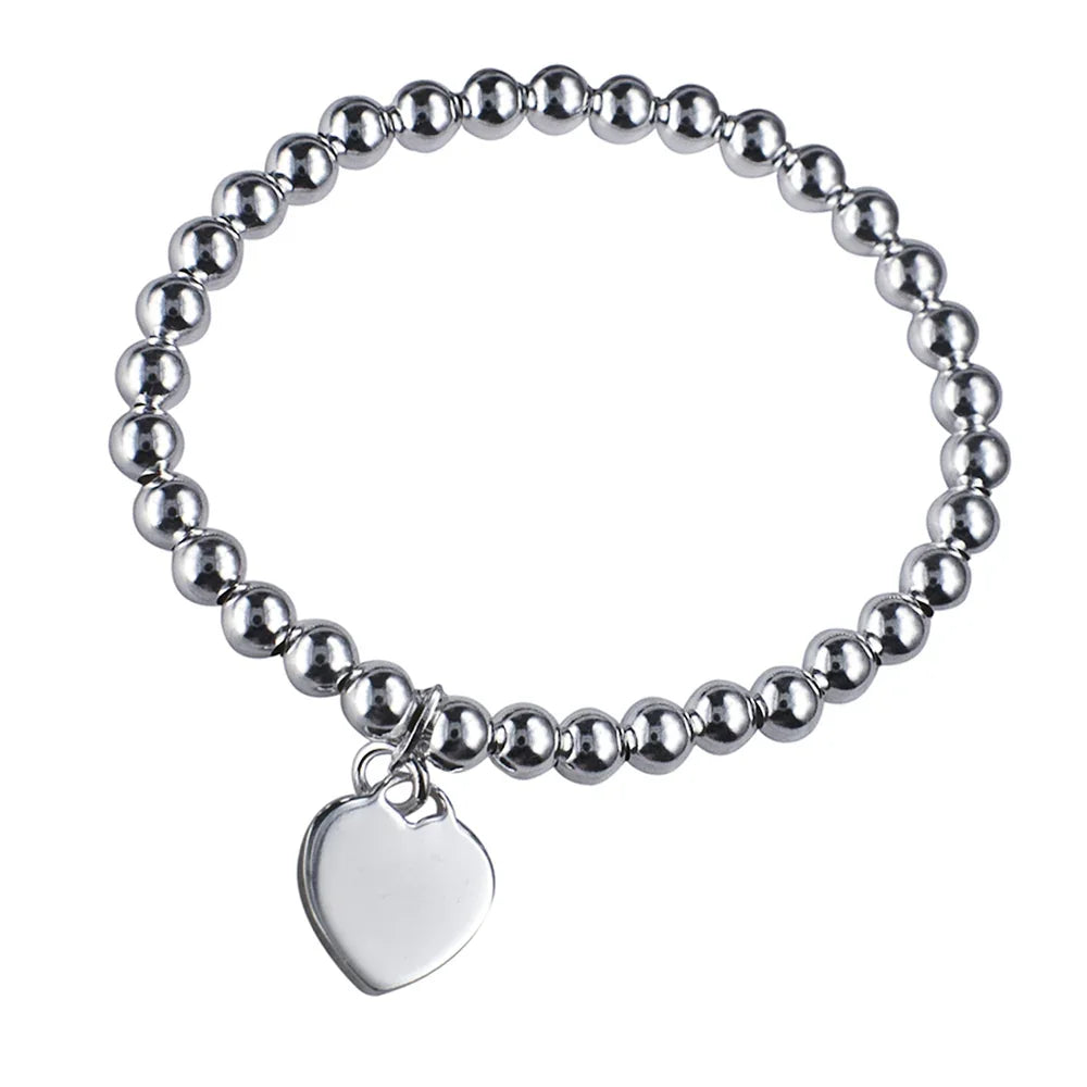 Silver Elastic Childs Bracelet with Heart - Nangar Gems